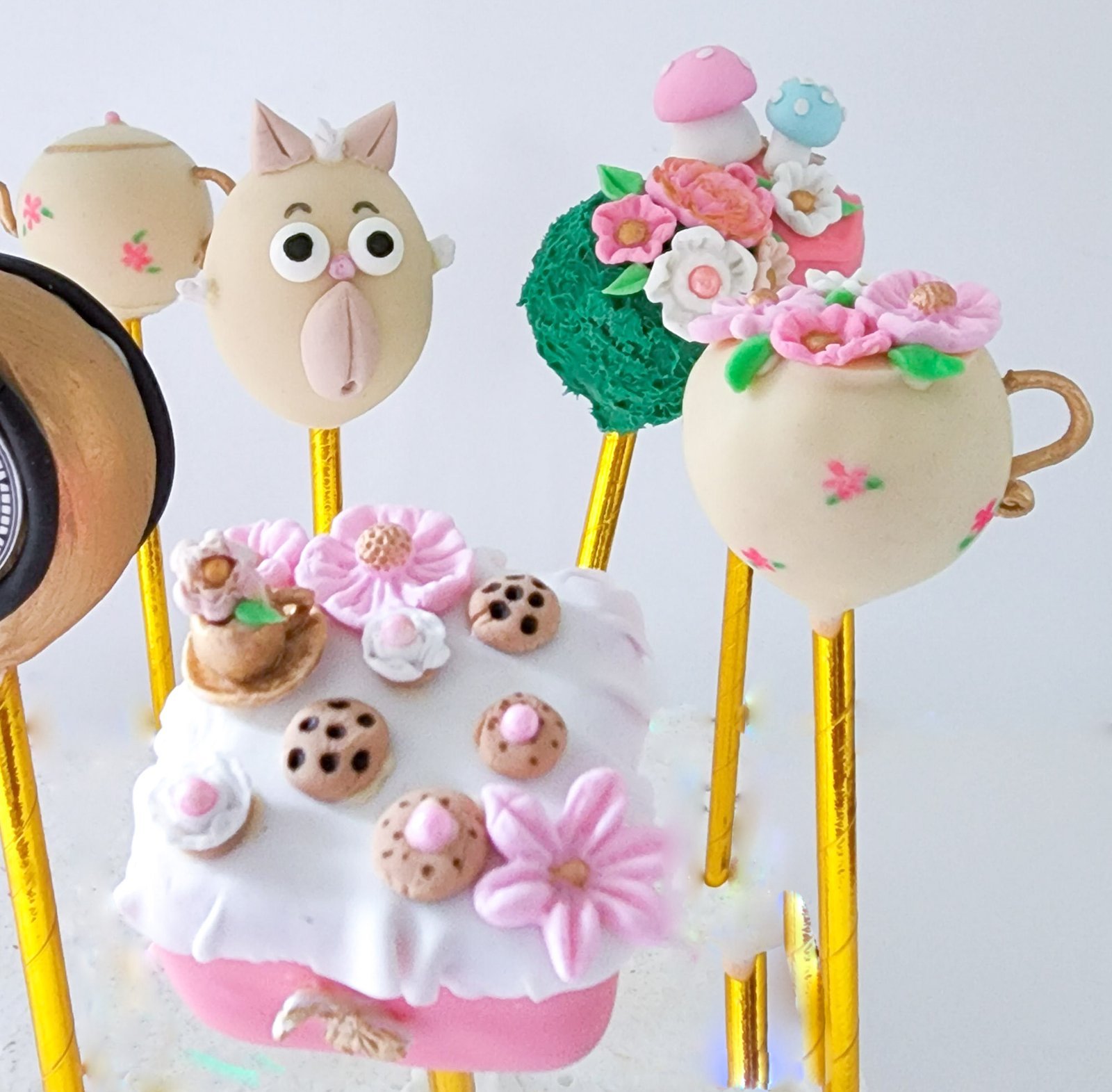 Alice in Onederland themed hand sculpted cake pops