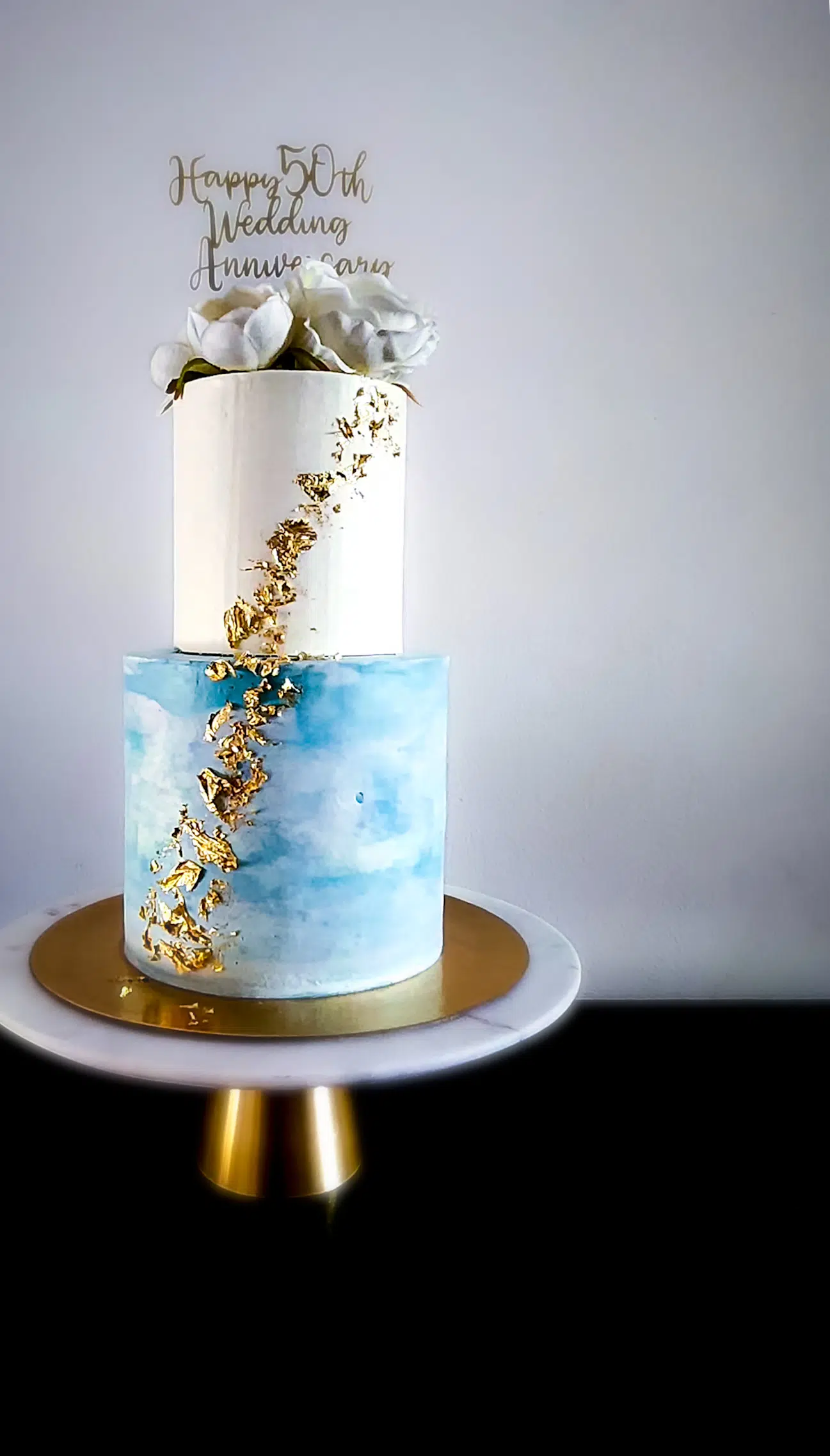 Two Tier White Blue Anniversary Cake